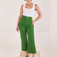 Soraya is 5'3" and wearing XXS Petite Heritage Westerns in Lawn Green paired with vintage off-white Cropped Tank Top
