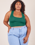Morgan is 5'5" and wearing L Cropped Tank Top in Hunter Green