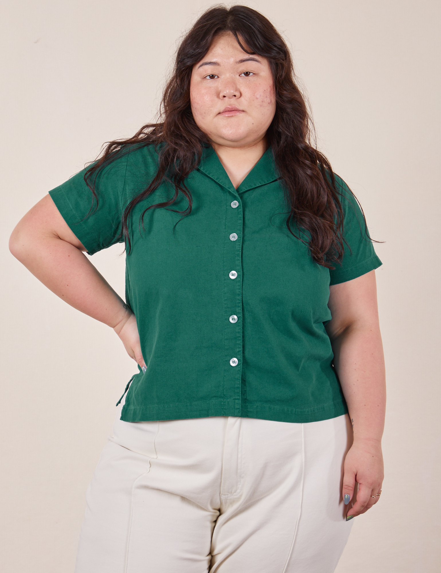 Ashley is wearing size L Pantry Button-Up in Hunter Green
