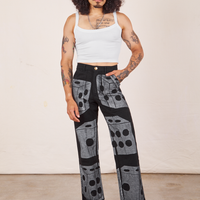 Jesse is 5'8" and wearing XS Icon Work Pants in Dice paired with vintage off-white Cropped Cami