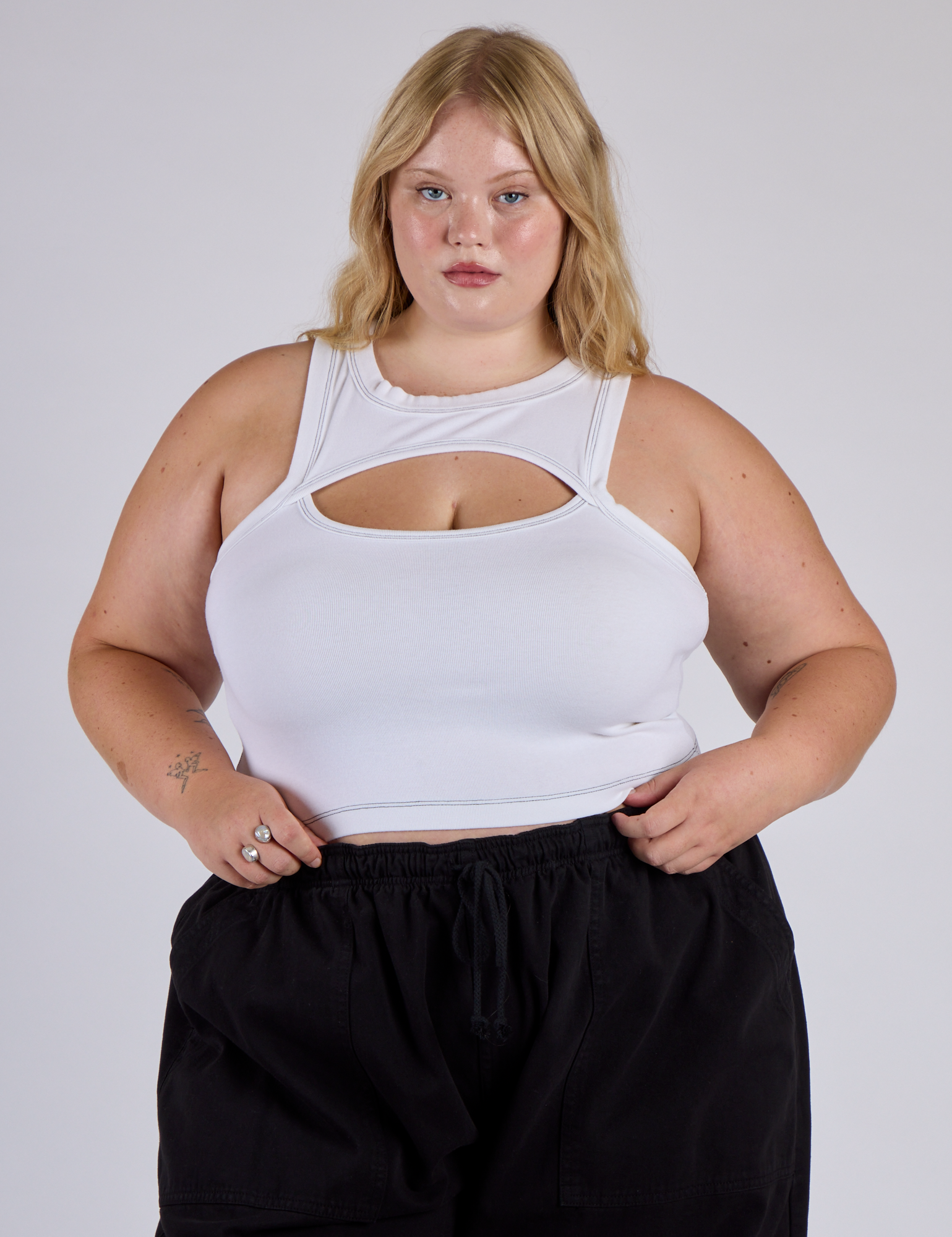 Juliet is 5’7” and wearing L Porthole Tank in Vintage Tee White