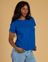 Kandia is 5'3" and wearing P Organic Vintage Tee in Royal Blue