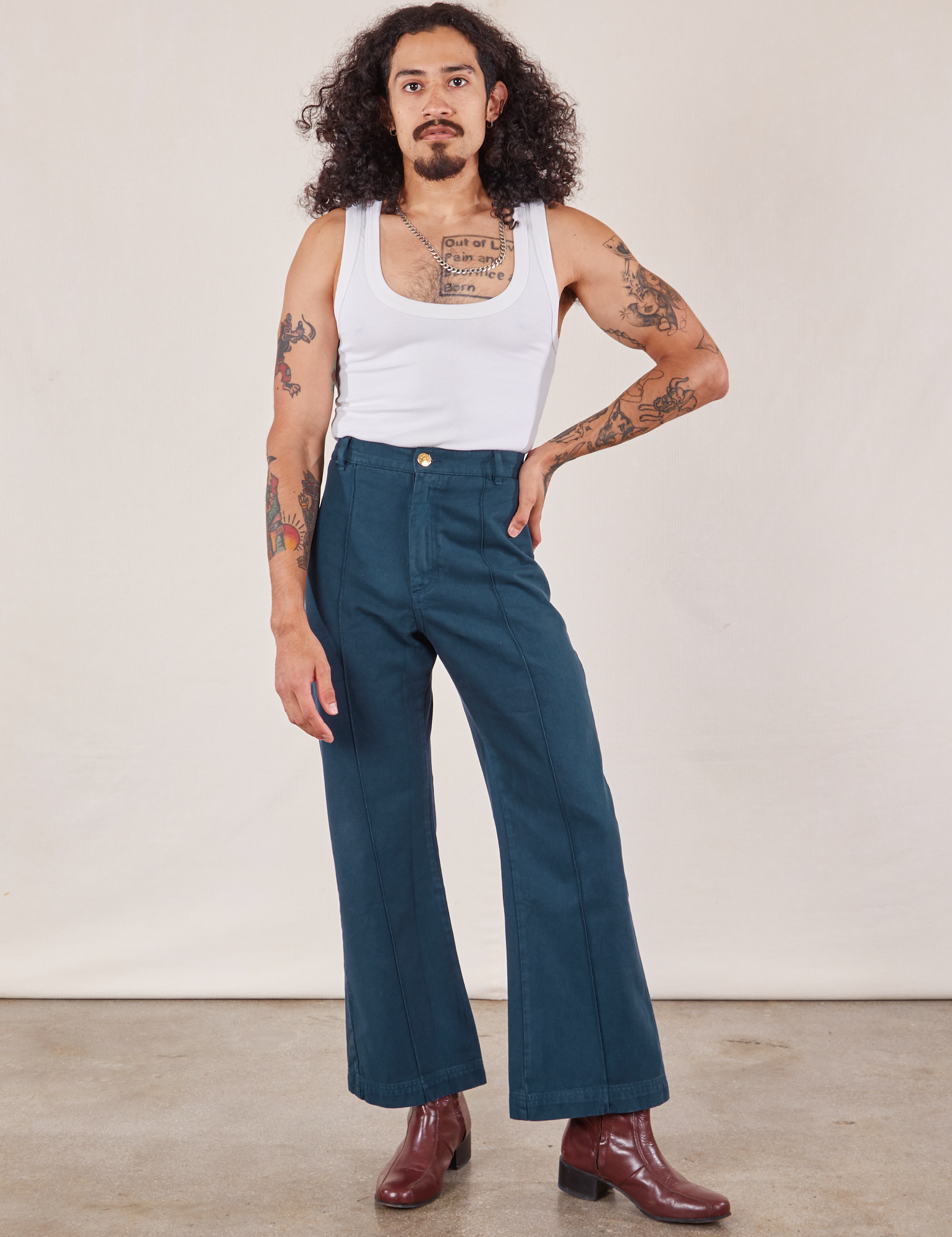 Jesse is 5&#39;8&quot; and wearing XS Western Pants in Lagoon paired with vintage tee off-white Cropped Tank