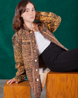 Hana is wearing Field Coat in Leopard Print