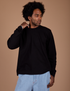 Jerrod is 6’3” and wearing M Long Sleeve Burly Tee in Basic Black
