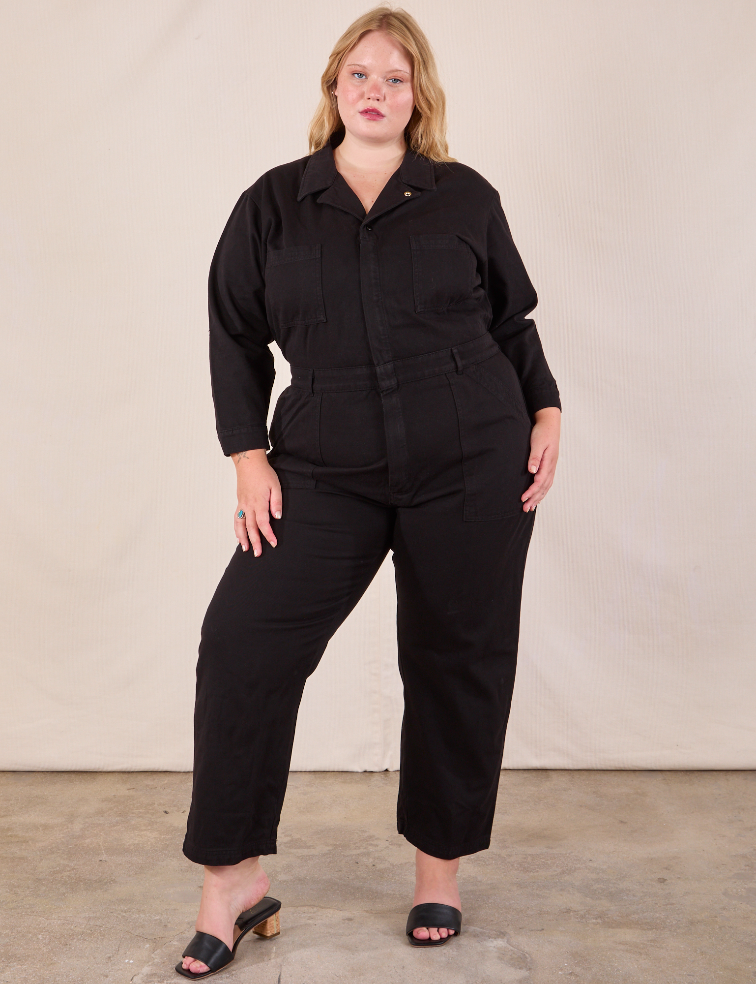 Juliet is 5&#39;7&quot; and wearing 1XL Long Sleeve Jumpsuit in Basic Black