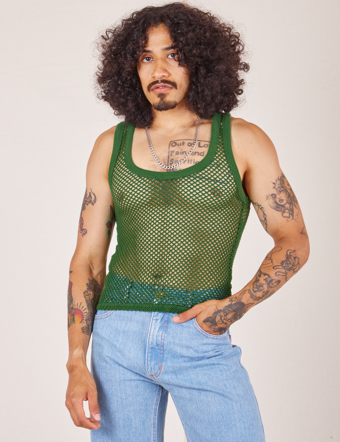 Jesse is 5'8" and wearing XS Mesh Tank Top in Lawn Green