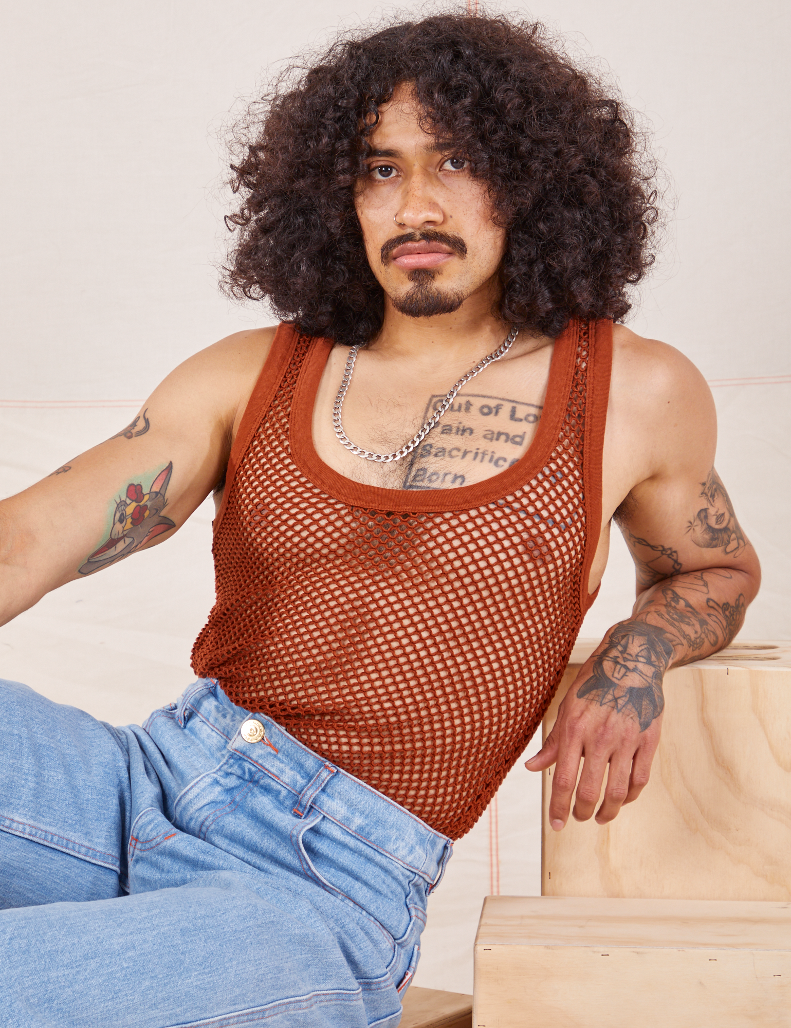 Jesse is 5&#39;8&quot; and wearing XS Mesh Tank Top in Burnt Terracotta