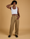 Jerrod is 6'3" and wearing M Baggy Mid-Rise Trousers in Desert Brown 