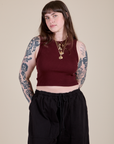 Sydney is 5'9" and wearing XXS Muscle Tee in Red Wine