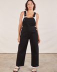 Tiara is 5'4" and wearing XS Original Overalls in Mono Black