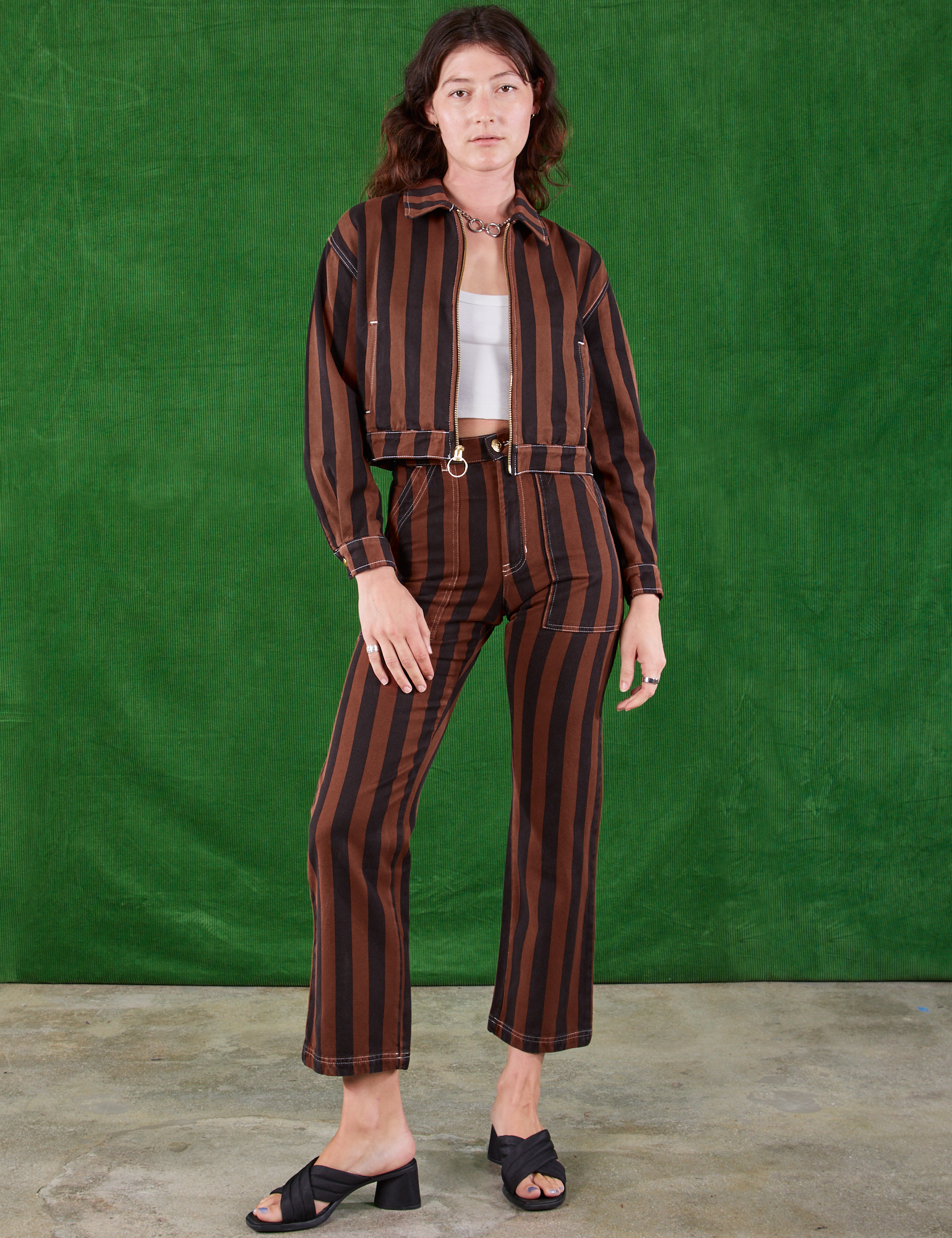 Alex is 5'8" and wearing XS Black Stripe Work Pants in Fudgesicle Brown paired with matching Ricky Jacket