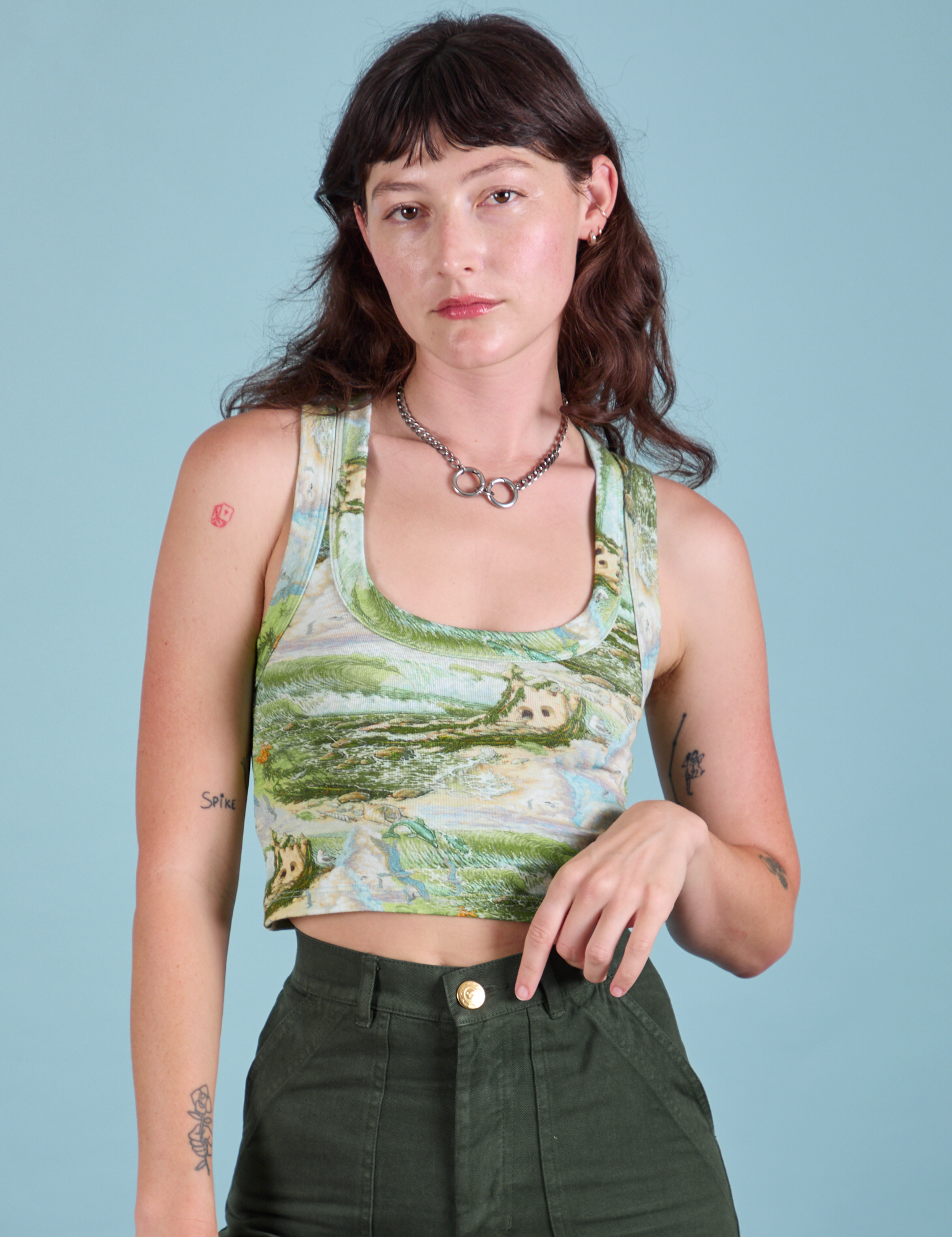 Alex is 5'8" and wearing P Cropped Tank Top in Ocean and Sky