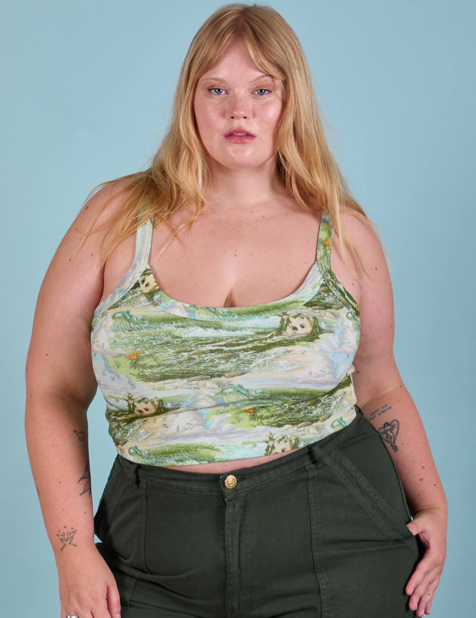 Juliet is 5'7" and wearing L Ocean and Sky in Cami