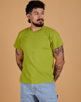 Jesse is 5’8” and wearing S Organic Vintage Tee in Gross Green