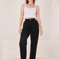 Alex is wearing Organic Trousers in Basic Black and vintage off-white Cropped Cami