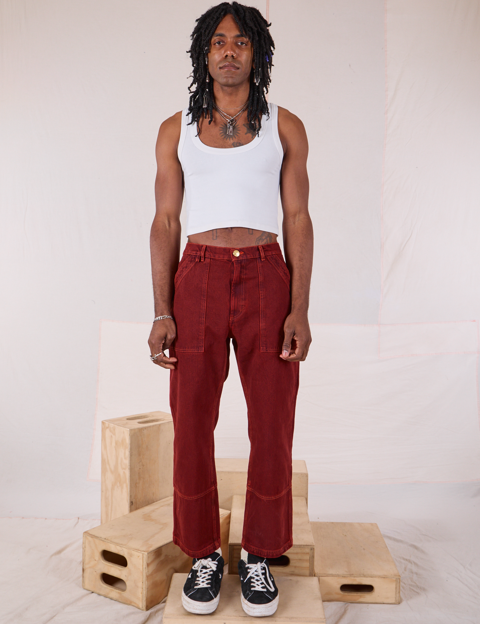 Jerrod is 6’3” and wearing M Overdyed Carpenter Jeans in Mustang Red