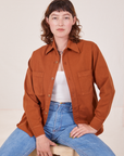 Alex is wearing size P Oversize Overshirt in Burnt Terracotta
