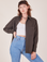 Alex is wearing size P Oversize Overshirt in Espresso Brown paired with a vintage off-white Cropped Tank Top underneath