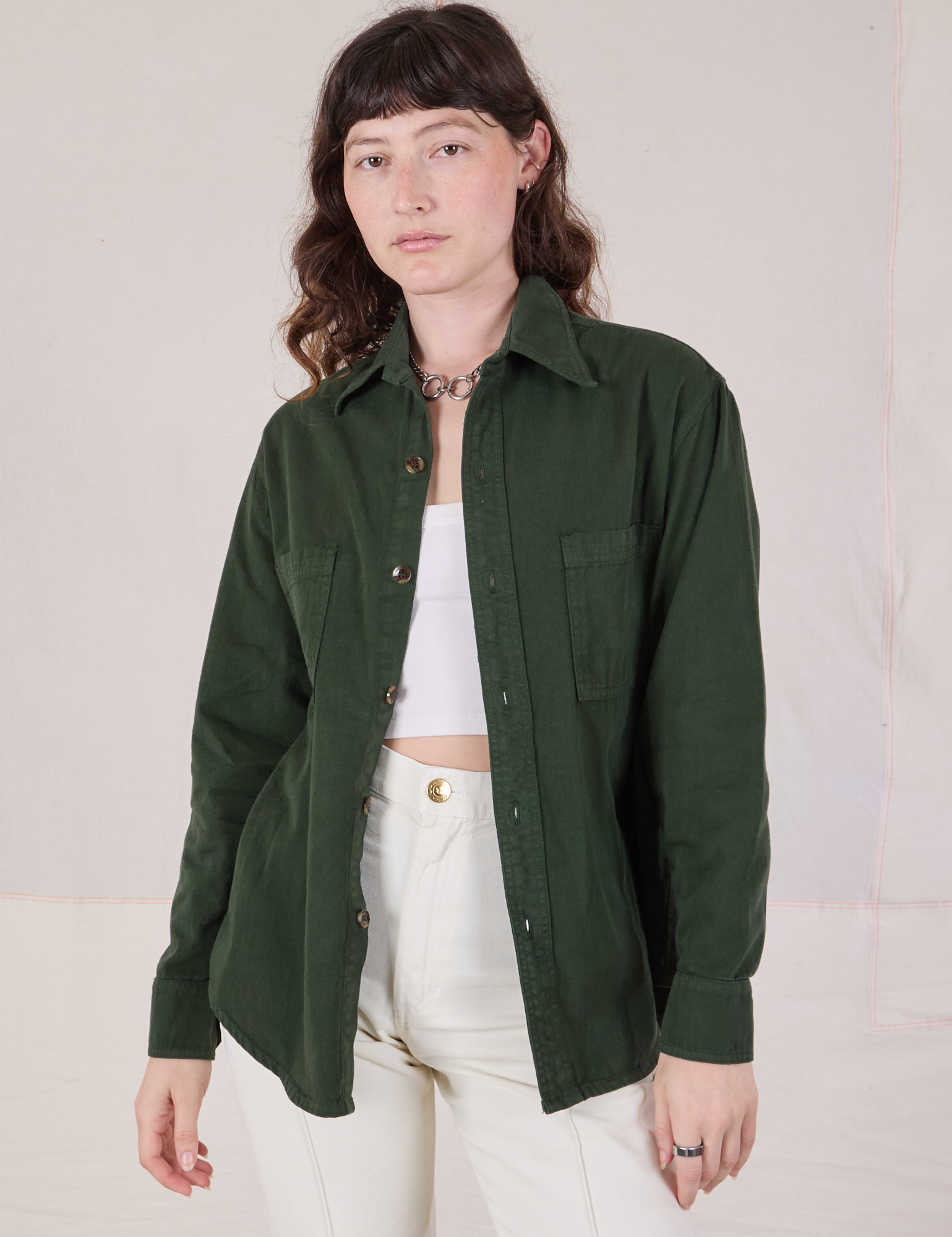 Alex is 5’8” and wearing P Twill Overshirt in Swamp Green