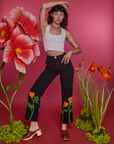 Alex is 5'8" and wearing XXS Paintstamped Work Pants in Poppy paired with a Vintage Tee White Cropped Tank