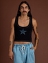 Anthony is 5’6” and wearing M Icon Cropped Tank in Black Star