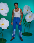 Jesse is 5'8" and wearing XS Paintstamped Work Pants in Daisy paired with a Cropped Tank in Vintage Tee White