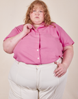 Catie is wearing size 5XL Pantry Button-Up in Bubblegum Pink paired with vintage off-white Western Pants