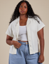 Meghna is 5’8” and wearing M Pantry Button-Up in Vintage Tee White