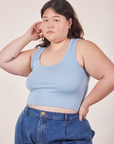 Ashley is 5'7" and wearing L Cropped Tank Top in Periwinkle