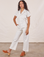 Blair is 5'3" and wearing XXS Petite Short Sleeve Jumpsuit in Vintage Tee Off-White