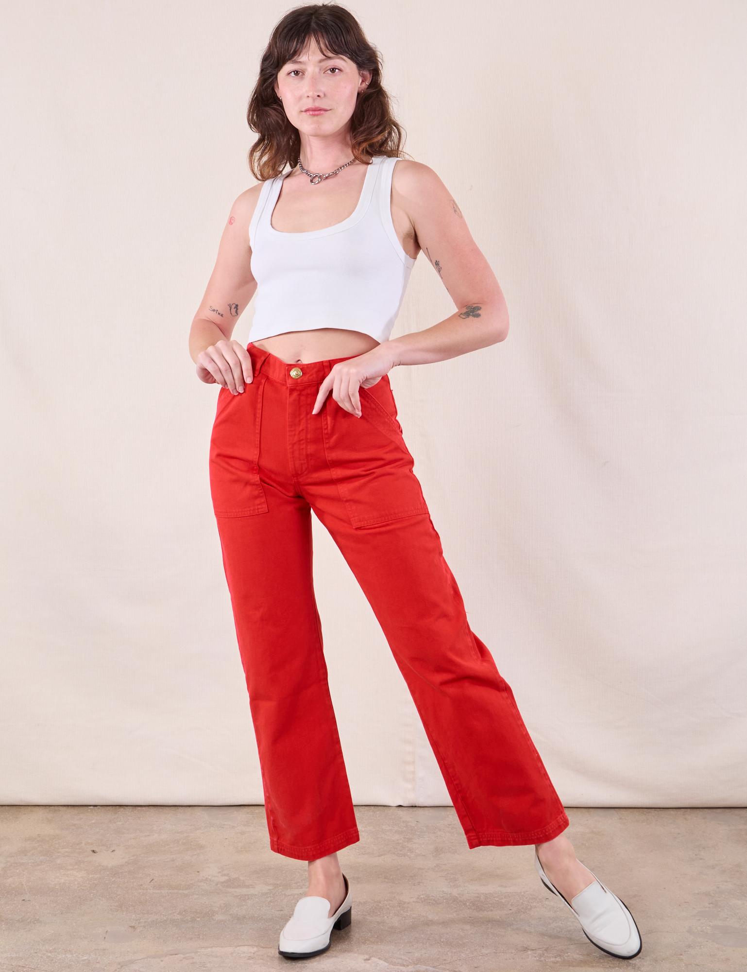 Alex is 5&#39;8&quot; and wearing XXS  Work Pants in Mustang Red paired with Cropped Tank in Vintage Tee Off-White