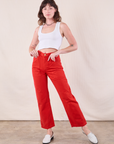 Alex is 5'8" and wearing XXS  Work Pants in Mustang Red paired with Cropped Tank in Vintage Tee Off-White