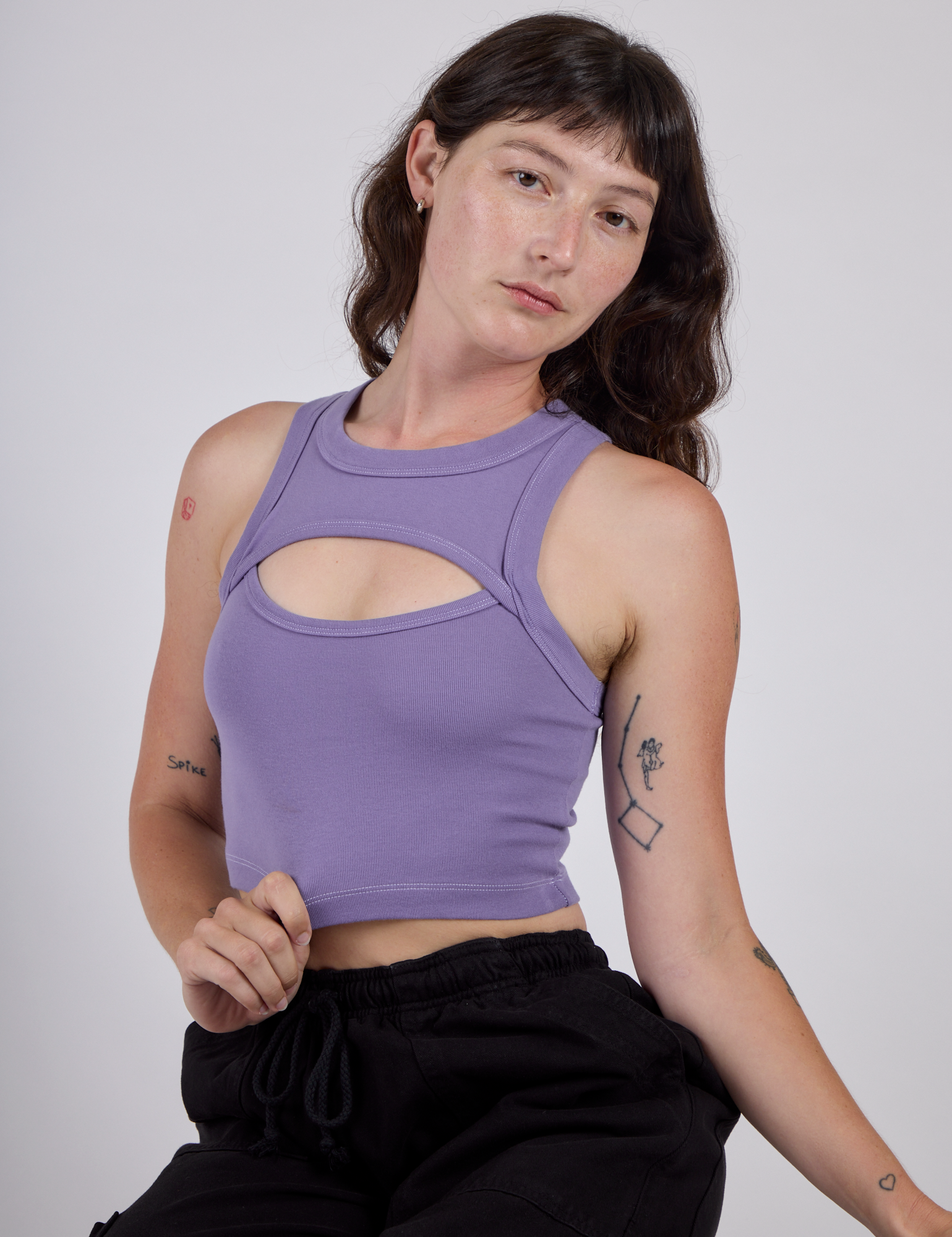 Alex is 5’8” and wearing P Porthole Tank in Faded Grape