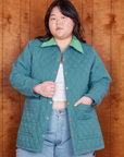 Ashley is 5'7" and wearing M Quilted Overcoat in Marine Blue