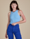 Alex is 5’8” and wearing P Racerback Tank in Baby Blue