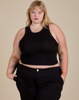 Juliet is 5’7” and wearing L Racerback Tank in Black