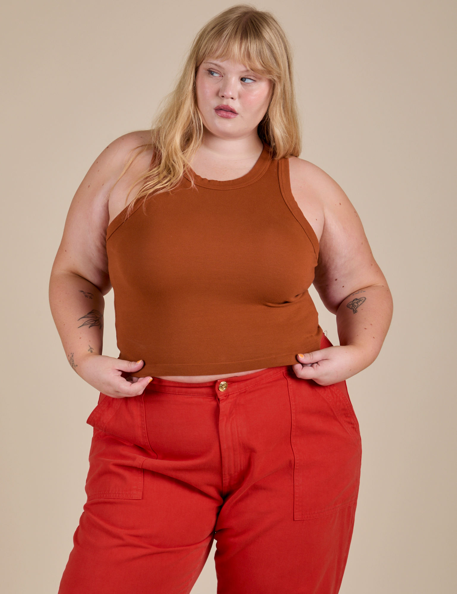 Juliet is 5’7” and wearing L Racerback Tank in Burnt Terracotta 