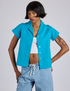 Kira is 5’10” and wearing P Pantry Button-Up in Hawaiian Blue