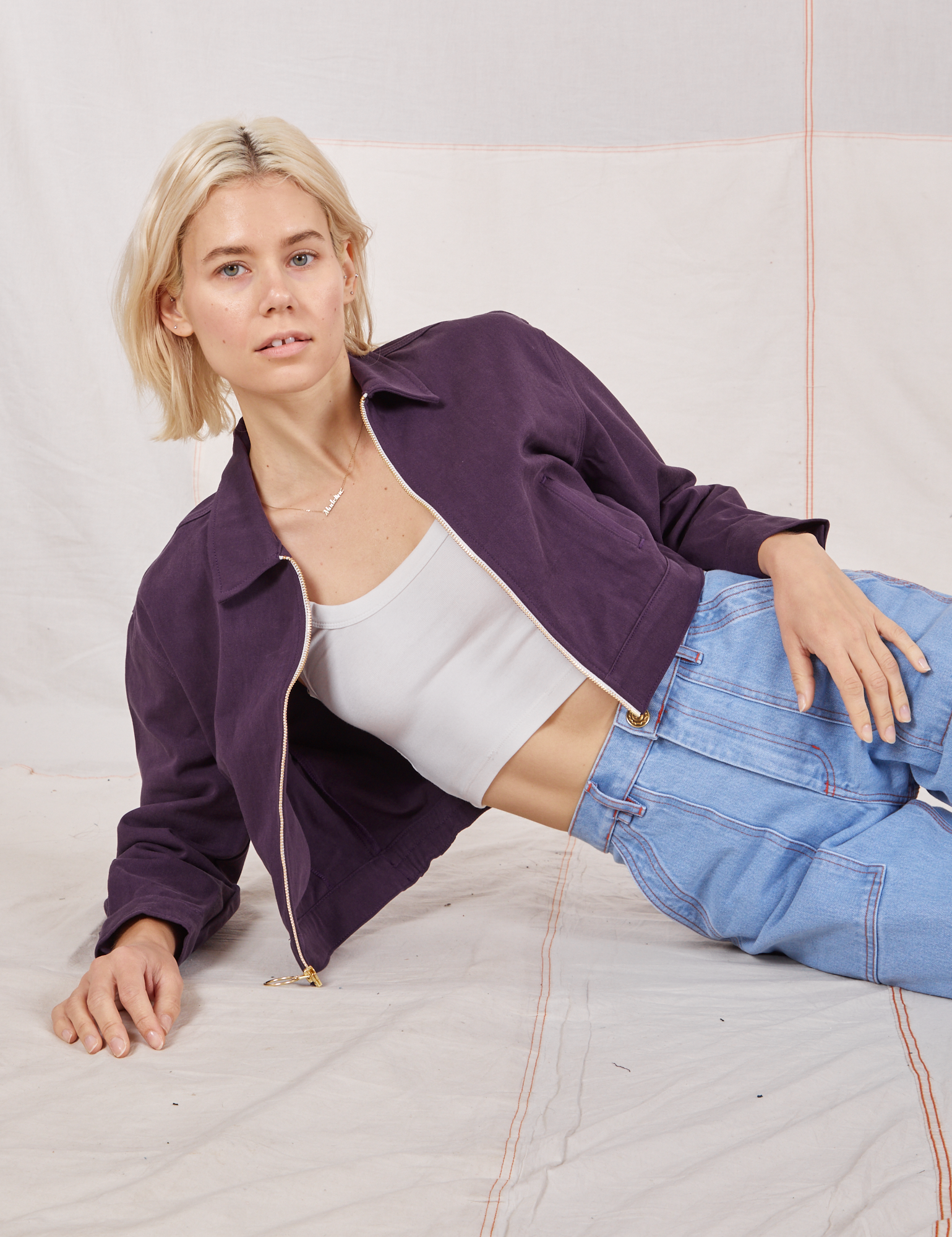 Madeline is wearing Ricky Jacket in Nebula Purple and vintage tee off-white Cropped Tank Top