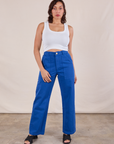 Tiara is 5'4" and wearing S Work Pants in Royal Blue paired with a Cropped Tank in vintage tee off-white