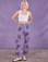 Madeline is 5'9" and wearing XXS Paintstamped Work Pants in Grape paired with a Cropped Tank in Vintage Tee Off-White