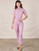 Alex is 5'8" and wearing XXS Short Sleeve Jumpsuit in Lilac