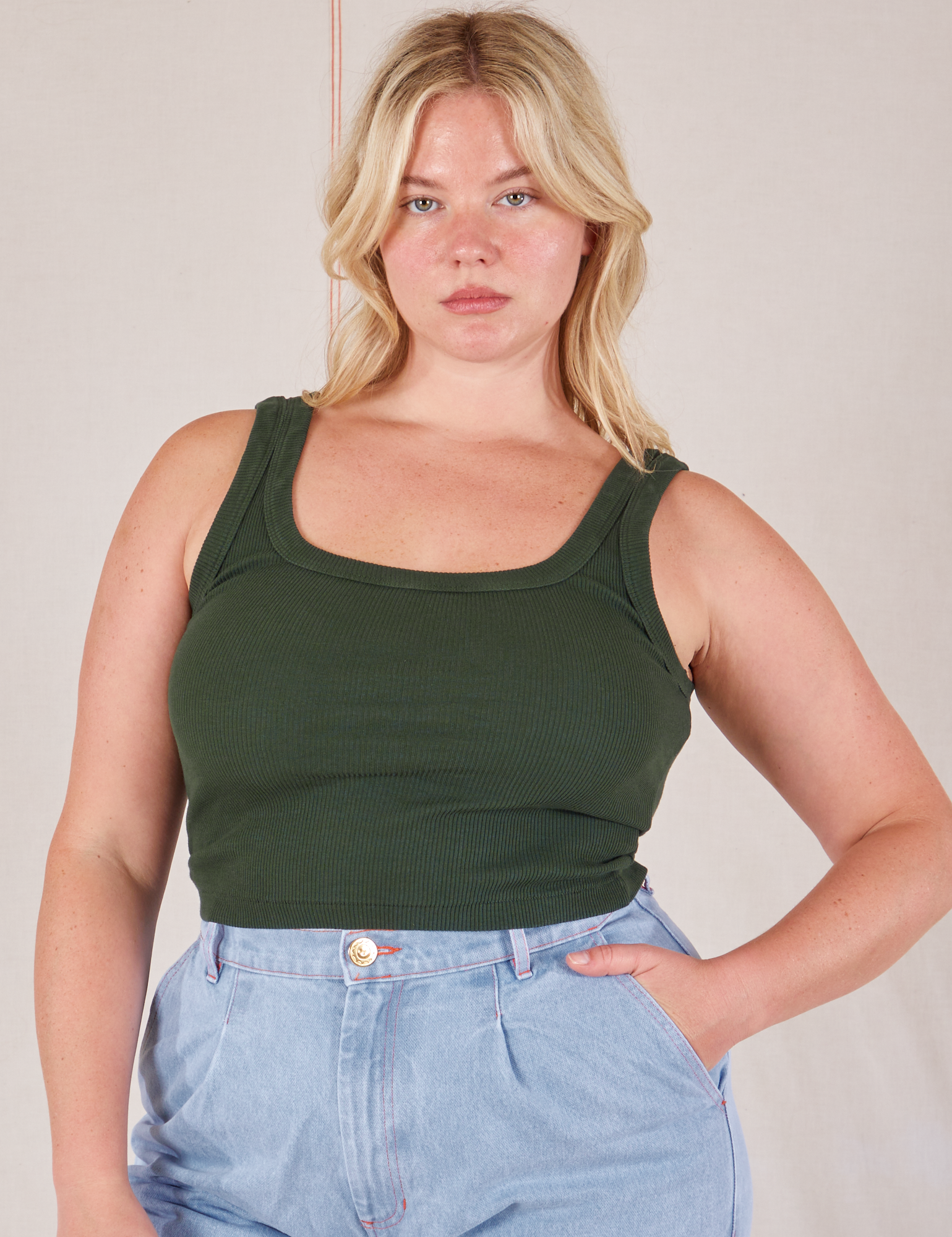 Lish is 5’8” and wearing L Square Neck Tank in Swamp Green