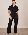 Tiara is 5'4" and wearing S Short Sleeve Jumpsuit in Basic Black