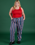 Juliet is 5’7” and wearing 1XL Work Pants in Pacific Stripe paired with mustang red Cropped Tank