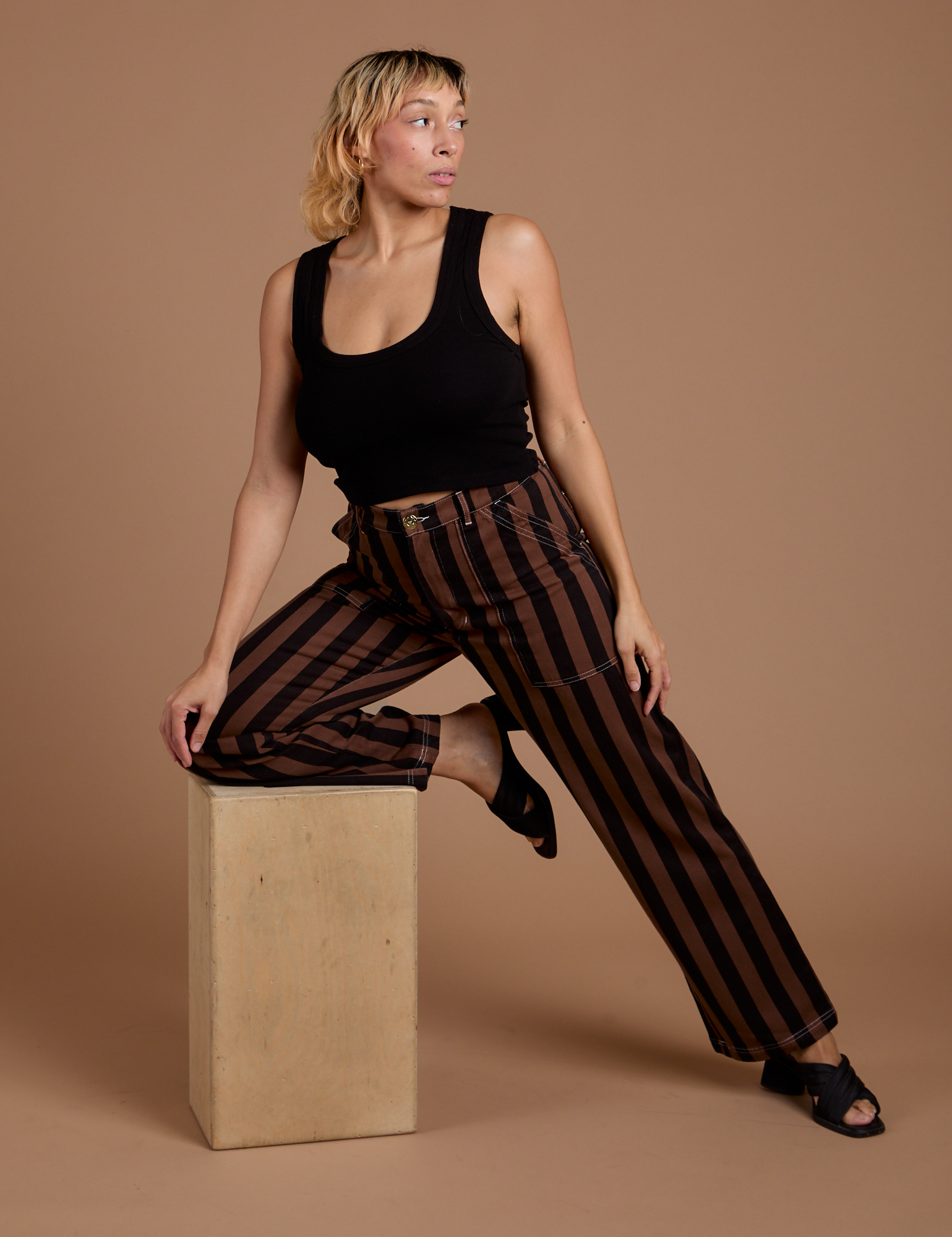 Black Stripe Work Pants in Fudgesicle Brown and black Cropped Tank on Tiara