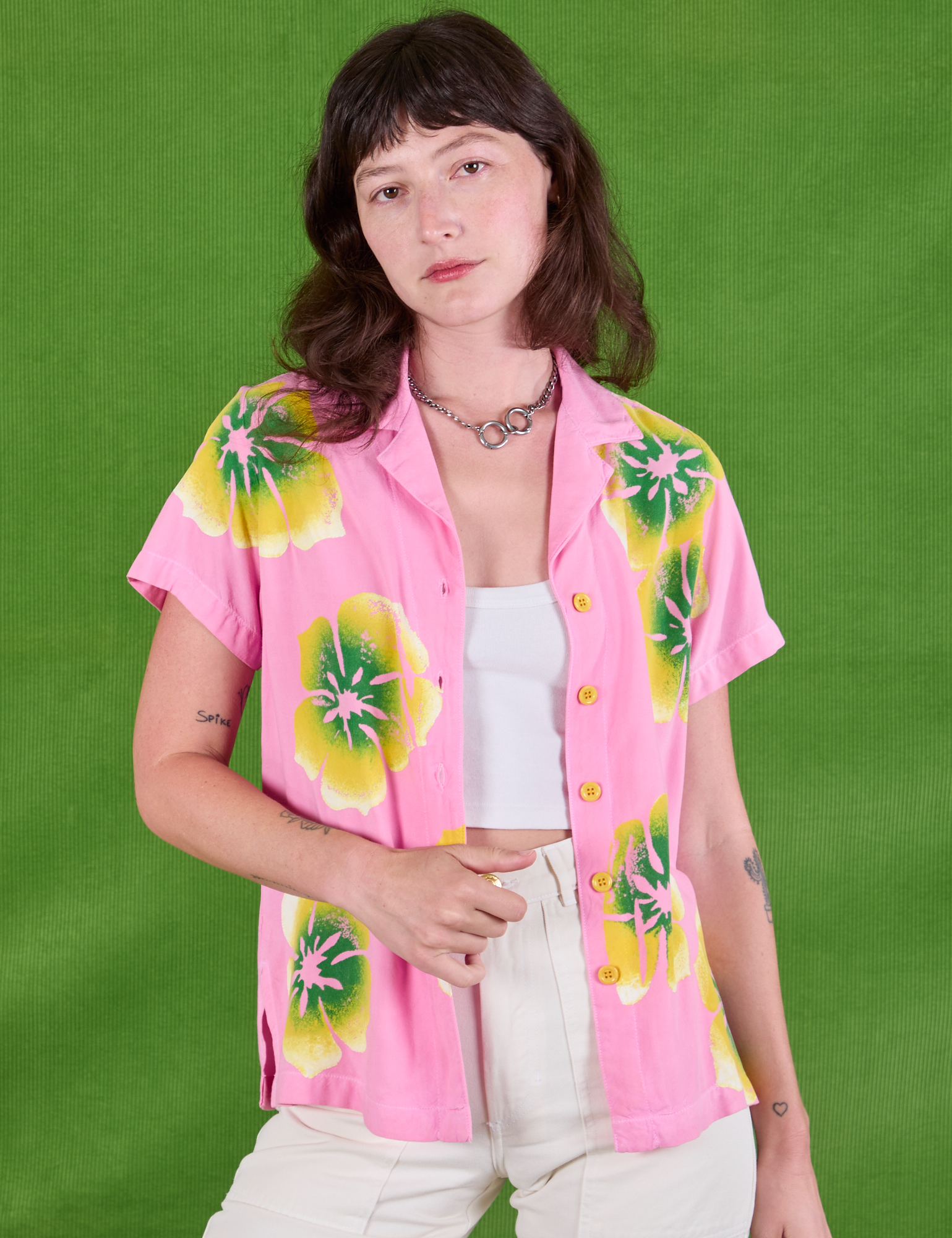 Alex is 5'8" and wearing P Paintstamped Pantry Button-Up in Bubblegum Pink