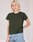 Madeline is 5'9" and wearing P Organic Vintage Tee in Swamp Green