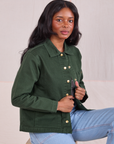 Kandia is 5'3" and wearing P Denim Work Jacket in Swamp Green